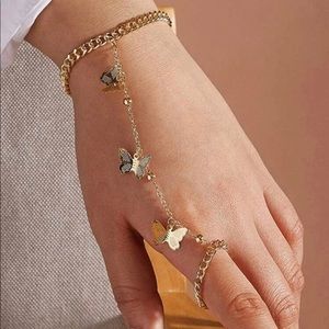 Butterfly finger linked bracelet